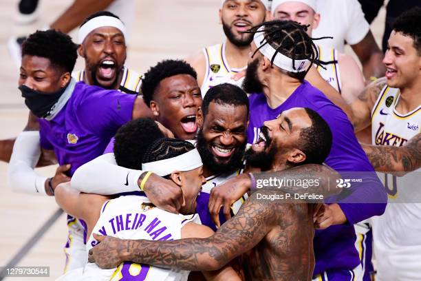 LAKE+BUENA+VISTA%2C+FLORIDA+-+OCTOBER+11%3A+LeBron+James+%2323+of+the+Los+Angeles+Lakers+celebrates+with+Quinn+Cook+%2328+of+the+Los+Angeles+Lakers+and+teammates+after+winning+the+2020+NBA+Championship+in+Game+Six+of+the+2020+NBA+Finals+at+AdventHealth+Arena+at+the+ESPN+Wide+World+Of+Sports+Complex+on+October+11%2C+2020+in+Lake+Buena+Vista%2C+Florida.+NOTE+TO+USER%3A+User+expressly+acknowledges+and+agrees+that%2C+by+downloading+and+or+using+this+photograph%2C+User+is+consenting+to+the+terms+and+conditions+of+the+Getty+Images+License+Agreement.++%28Photo+by+Douglas+P.+DeFelice%2FGetty+Images%29