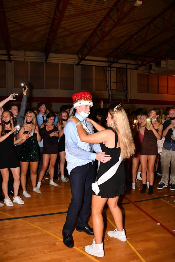 Homecoming+king+Liam+Buckley+and+homecoming+queen+Emma+Talago+take+a+turn+on+the+dance+floor.