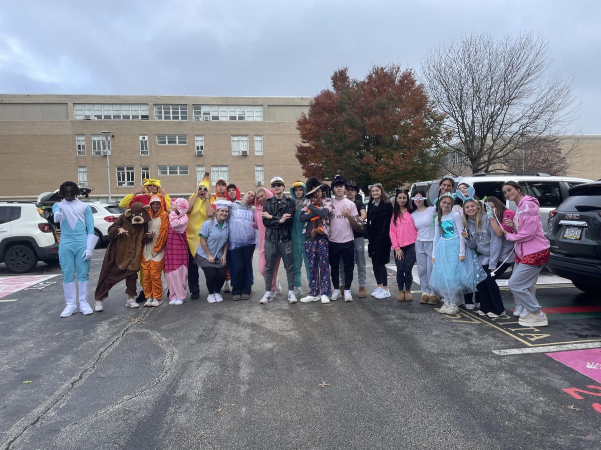 12th grade students in Mr. Valentis theology classes dress up for Trunk-or-Treat.