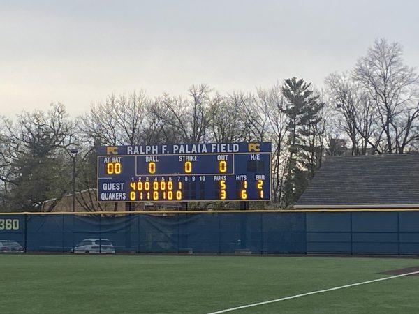 The scoreboard displays Carrolls win over Penn Charter.
