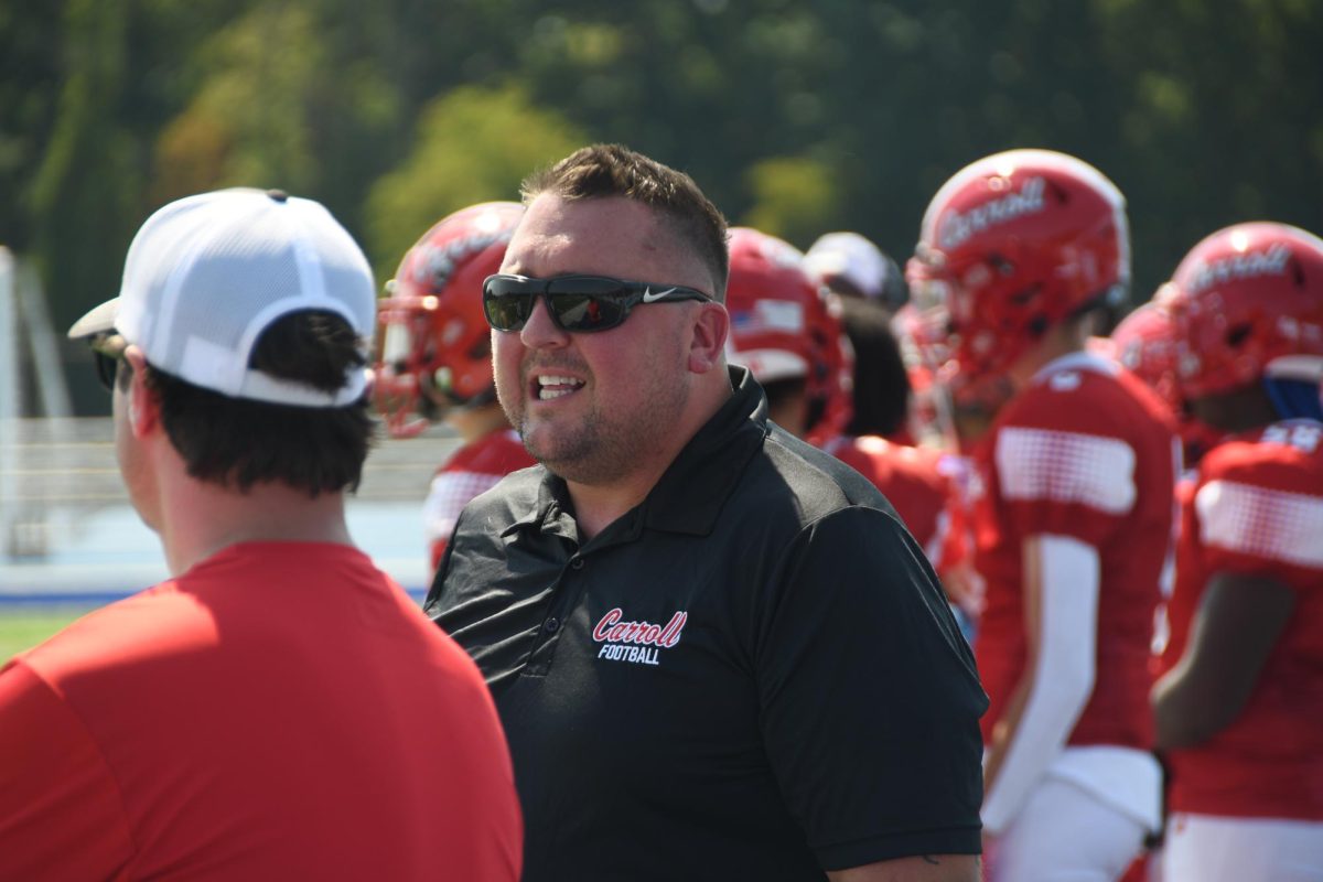 Kyle Detweiler coaches the Patriots in September.