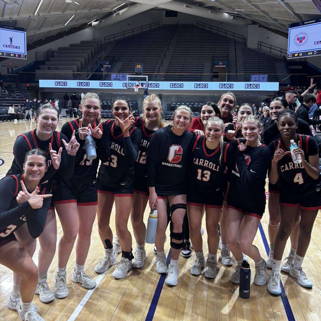 The Archbishop Carroll varsity girls basketball team celebrates punching its ticket to the Philadelphia Catholic League championship.