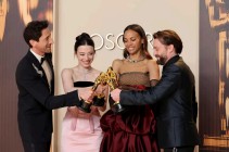 Actors Adrien Brody, Mikey Madison, Zoe Saldaña, and Kieran Culkin hang out with their Oscars after Sunday night's Academy Awards ceremony.