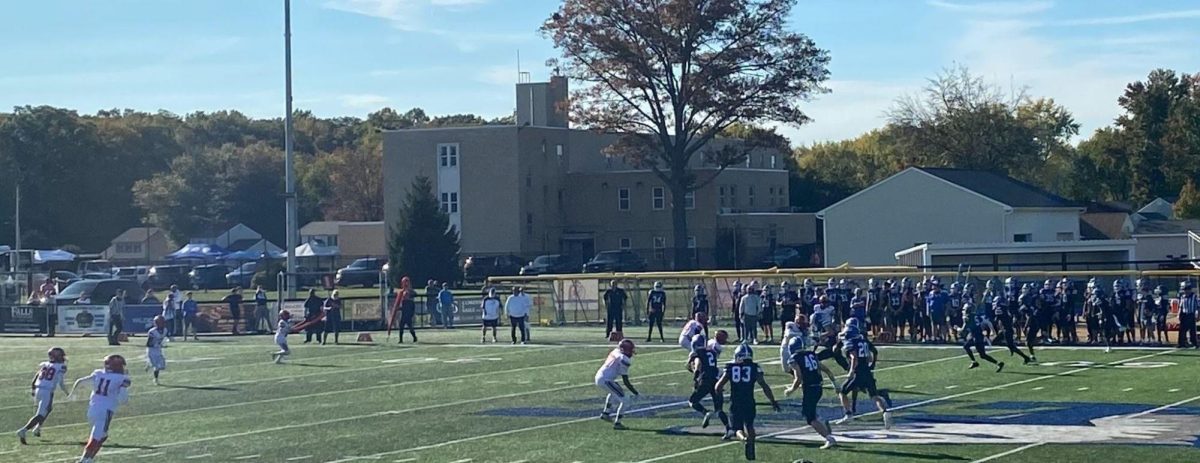 Carroll receives the second half kickoff from Egan.