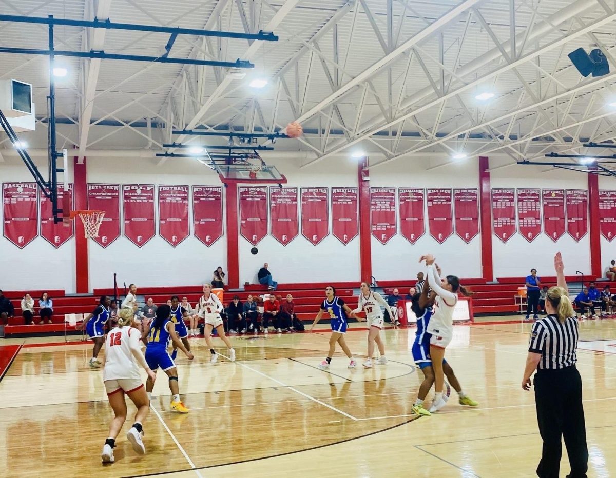 Carroll girls basketball adds three points in its contest against West Catholic.